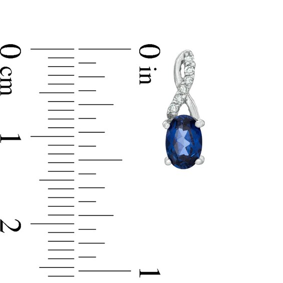 Oval Lab-Created Blue Sapphire and Diamond Accent Twist Earrings in 10K White Gold