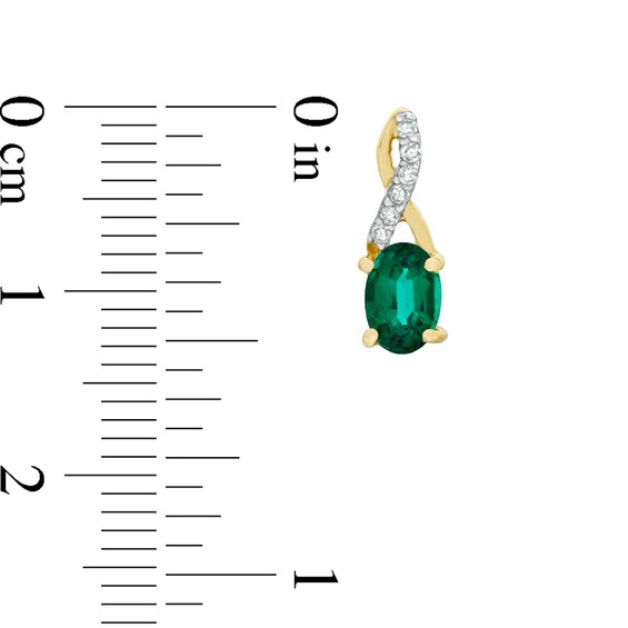 Oval Lab-Created Emerald and Diamond Accent Twist Earrings in 10K Gold