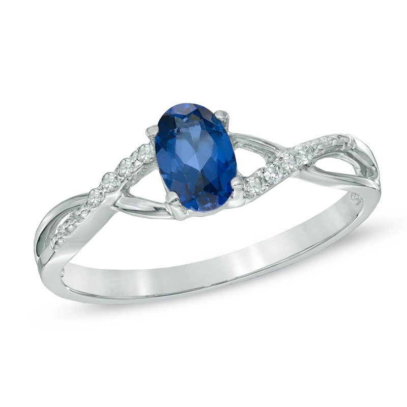 Main Image 1 of Oval Lab-Created Blue Sapphire and Diamond Accent Twist Engagement Ring in 10K White Gold