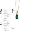 Thumbnail Image 1 of Oval Lab-Created Emerald and Diamond Accent Twist Pendant in 10K Gold