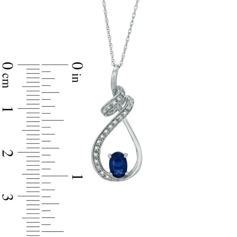 Oval Blue Sapphire and Diamond Accent Swirling Loop Pendant in 10K White Gold