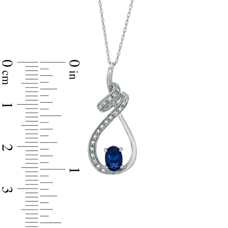 Main Image 2 of Oval Blue Sapphire and Diamond Accent Swirling Loop Pendant in 10K White Gold