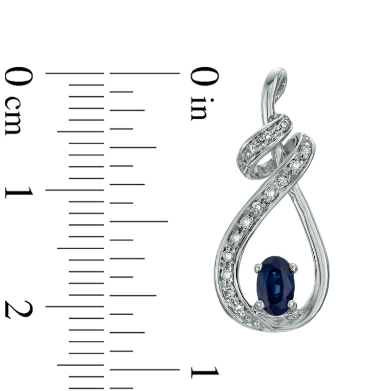 Main Image 2 of Oval Blue Sapphire and Diamond Accent Swirling Loop Earrings in 10K White Gold