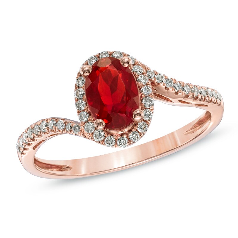 Oval Fire Opal and 1/5 CT. T.W. Diamond Frame Ring in 10K Rose Gold