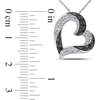 Thumbnail Image 2 of 1/3 CT. T.W. Enhanced Black and White Diamond Tilted Heart Pendant in 10K White Gold - 17"