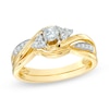 Thumbnail Image 1 of 1/3 CT. T.W. Diamond Twist Shank Bridal Set in 10K Gold