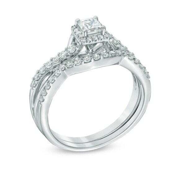 3/4 CT. T.w. Princess-Cut Diamond Frame Twist Shank Bridal Set in 10K White Gold