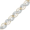Thumbnail Image 1 of Infinity Link Bracelet in 10K Two-Tone Gold - 7.25"