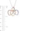 Thumbnail Image 1 of 1/10 CT. T.W. Diamond Triple Heart Pendant in 10K Tri-Tone Gold