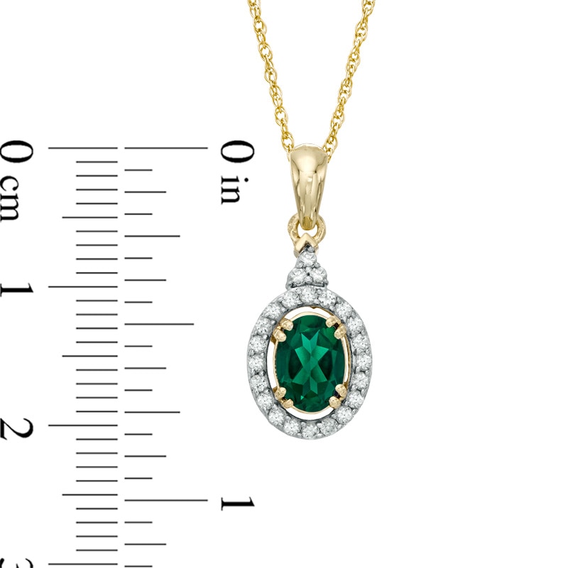Main Image 2 of Oval Lab-Created Emerald and White Sapphire Frame Pendant in 10K Gold