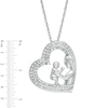 Thumbnail Image 1 of 1/3 CT. T.W. Diamond Motherly Love Tilted Heart Pendant in Sterling Silver