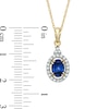 Thumbnail Image 1 of Oval Lab-Created Ceylon and White Sapphire Frame Pendant in 10K Gold