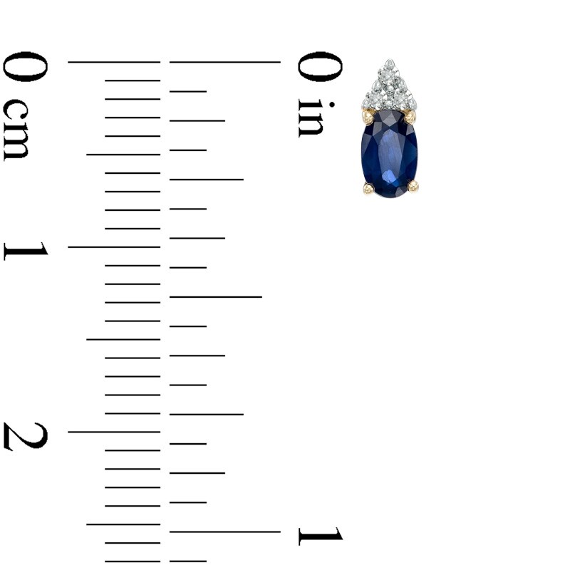 Main Image 2 of Oval Blue Sapphire and Diamond Accent Stud Earrings in 14K Gold