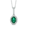 Oval Emerald and 1/6 CT. T.W. Diamond Frame Pendant in 14K White Gold
