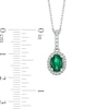Thumbnail Image 2 of Oval Emerald and 1/6 CT. T.W. Diamond Frame Pendant in 14K White Gold