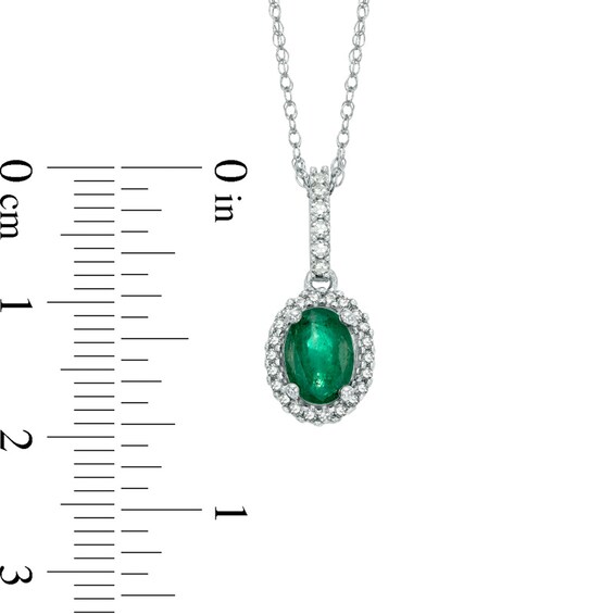 Oval Emerald and 1/6 CT. T.w. Diamond Frame Pendant in 14K White Gold