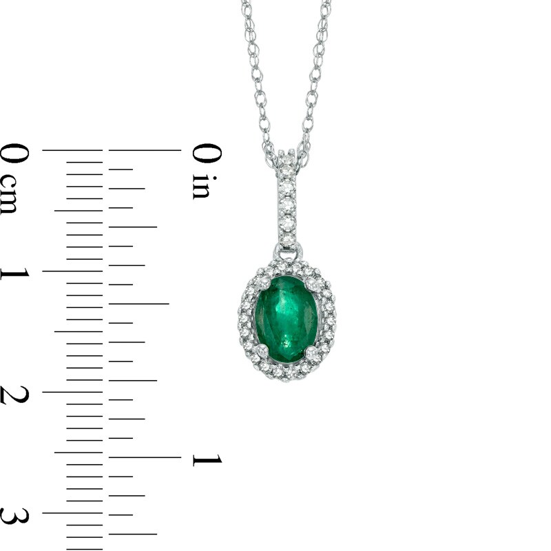 Main Image 2 of Oval Emerald and 1/6 CT. T.W. Diamond Frame Pendant in 14K White Gold