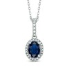 Thumbnail Image 1 of Oval Blue Sapphire and 1/6 CT. T.W. Diamond Frame Pendant in 14K White Gold