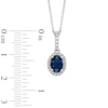 Thumbnail Image 1 of Oval Blue Sapphire and 1/6 CT. T.W. Diamond Frame Pendant in 14K White Gold