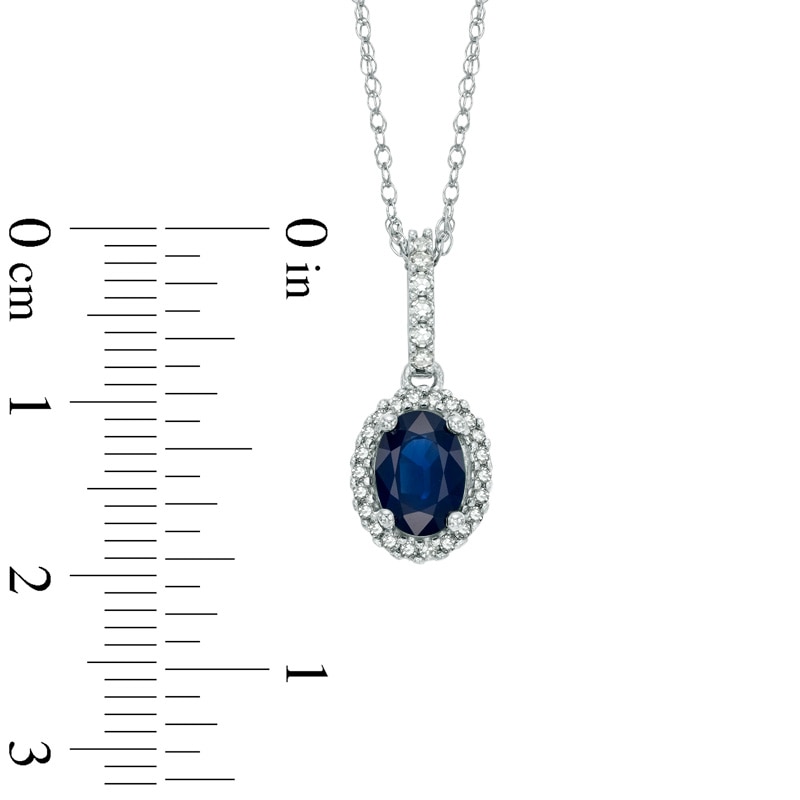 Oval Blue Sapphire and 1/6 CT. T.W. Diamond Frame Pendant in 14K White Gold