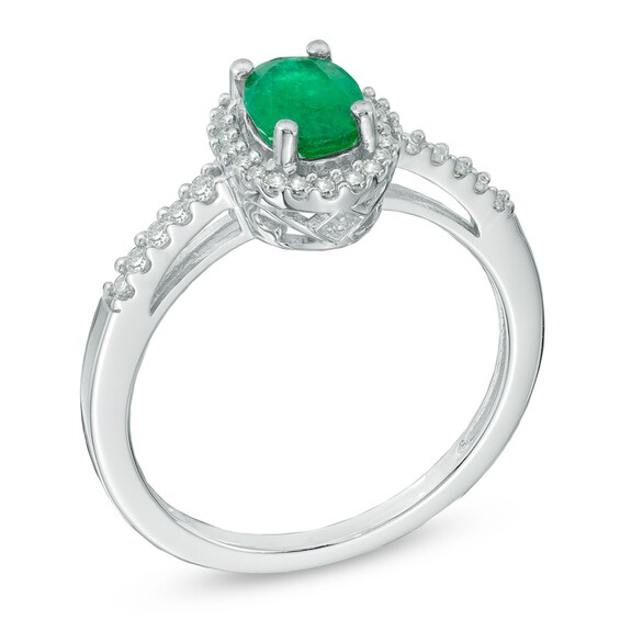 Oval Emerald and 1/5 CT. T.w. Diamond Frame Ring in 14K White Gold