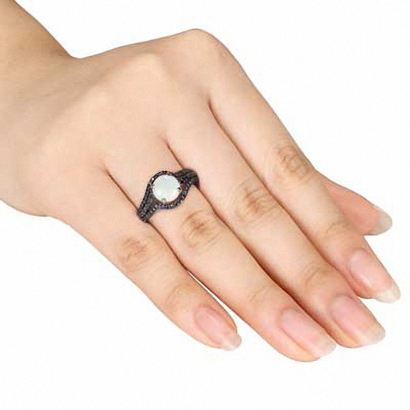 8.0mm Opal and 1/10 CT. T.W. Black Diamond Swirl Ring in Sterling Silver