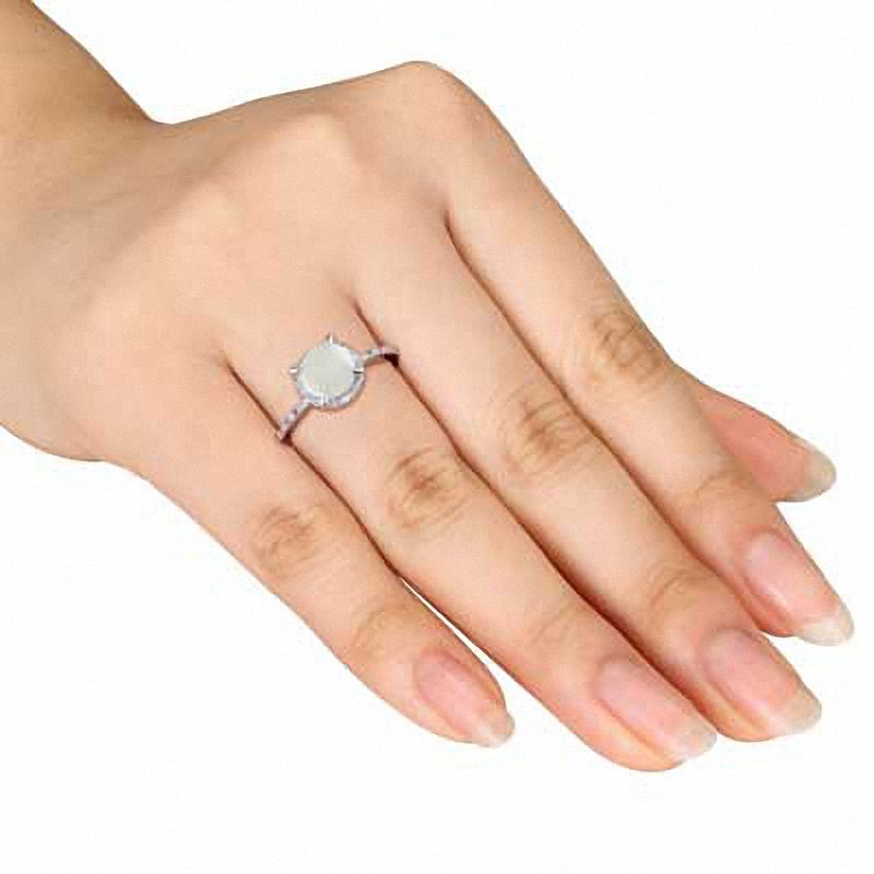 7.0mm Opal and 1/20 CT. T.W. Diamond Ring in Sterling Silver