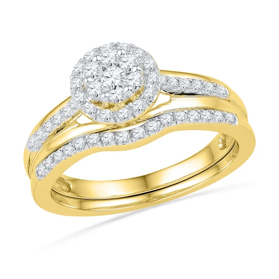 1/2 CT. T.w. Diamond Cluster Frame Bridal Set in 10K Gold