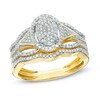 Thumbnail Image 0 of 1/3 CT. T.W. Diamond Oval Composite Frame Bridal Set in 10K Gold