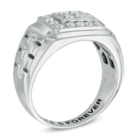 1/2 CT. T.w. Diamond Wedding Band in Sterling Silver (16 Characters)