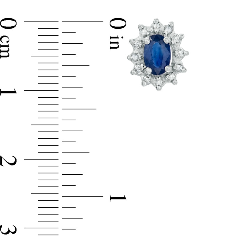 Main Image 2 of Oval Blue Sapphire and 1/5 CT. T.W. Diamond Frame Stud Earrings in 10K White Gold