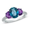 Thumbnail Image 1 of Oval London Blue Topaz, Amethyst and 1/10 CT. T.W. Diamond Three Stone Ring in Sterling Silver