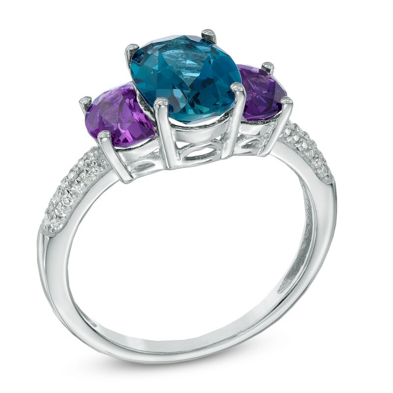 Main Image 2 of Oval London Blue Topaz, Amethyst and 1/10 CT. T.W. Diamond Three Stone Ring in Sterling Silver