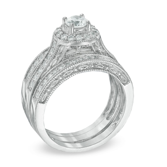 1 CT. T.w. Diamond Frame Three Piece Bridal Set in 14K White Gold