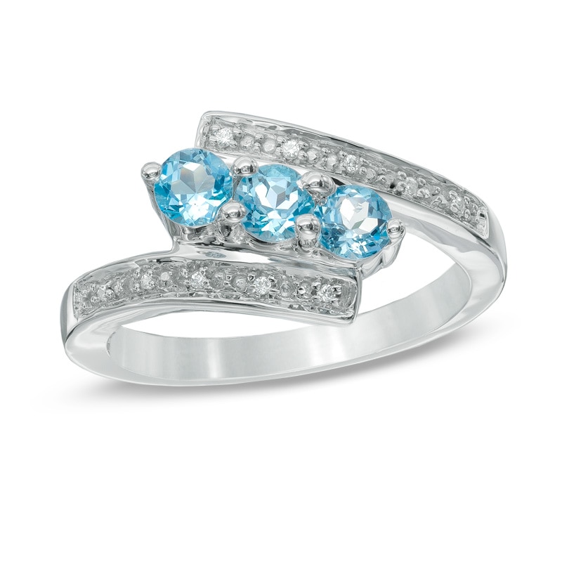 Blue Topaz and Diamond Accent Three Stone Bypass Ring in Sterling Silver