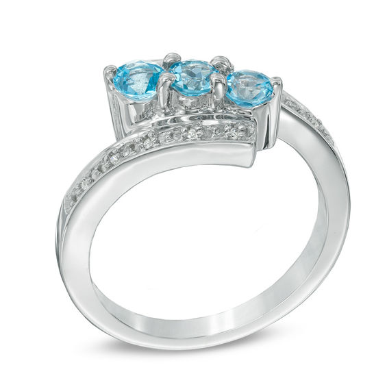 Blue Topaz and Diamond Accent Three Stone Bypass Ring in Sterling Silver