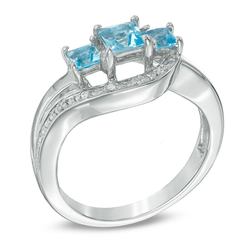 Princess-Cut Blue Topaz and Diamond Accent Three Stone Swirl Promise Ring in Sterling Silver