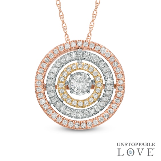 1/2 CT. T.w. Diamond Orbit Pendant in 10K Tri-Tone Gold
