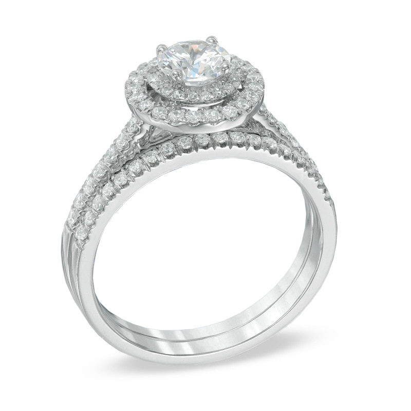 1 CT. T.W. Certified Canadian Diamond Double Frame Bridal Set in 14K White Gold (I/I1)