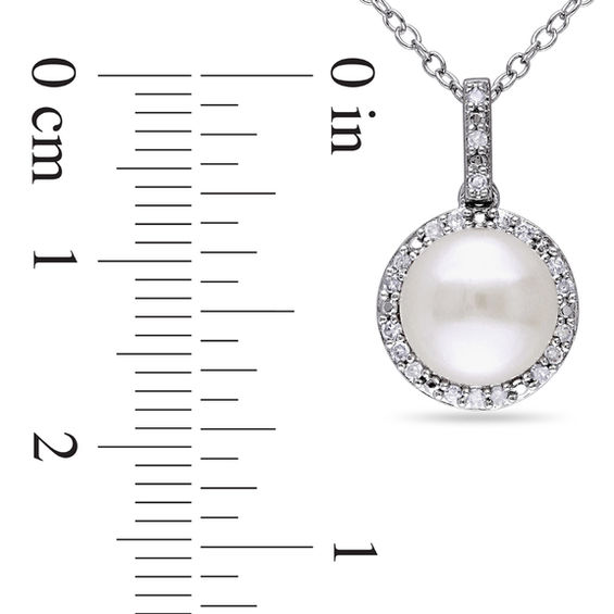 8.0 - 8.5mm Button Cultured Freshwater Pearl and 1/10 CT. T.W. Diamond Frame Pendant in Sterling Silver 8.0 - 8.5mm Button Cultured Freshwater Pearl and 1/10 CT. T.W. Diamond Frame Pendant in Sterling Silver