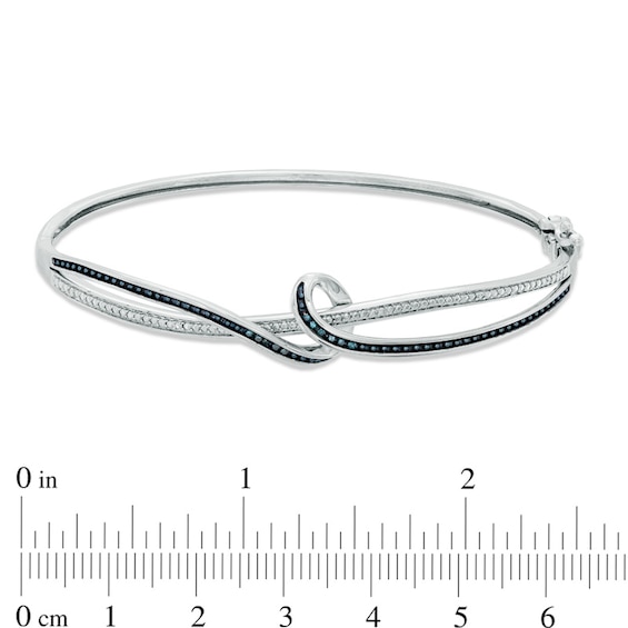 1/8 CT. T.w. Enhanced Blue and White Diamond Abstract Three Piece Set in Sterling Silver