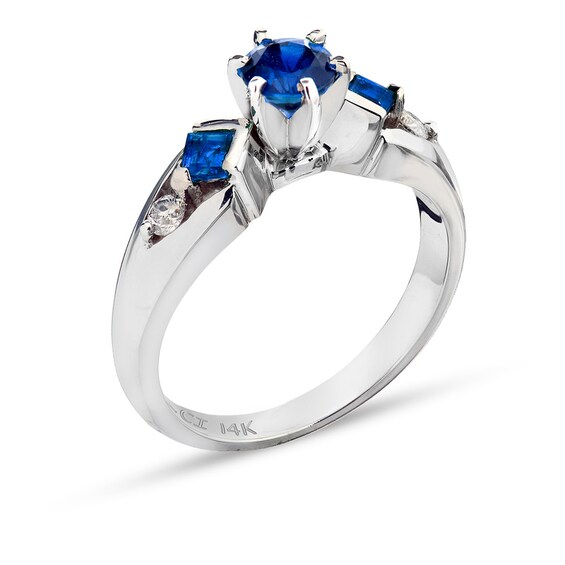 5.0mm Blue Sapphire and 1/10 CT. T.w. Diamond Engagement Ring in 14K White Gold
