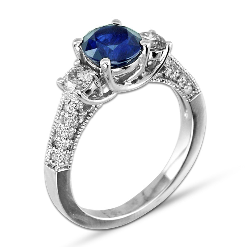 6.5mm Blue Sapphire and 1/2 CT. T.W. Diamond Three Stone Ring in 14K White Gold |