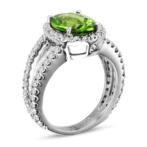 Oval Peridot and 7/8 CT. T.w. Diamond Ring in 14K White Gold
