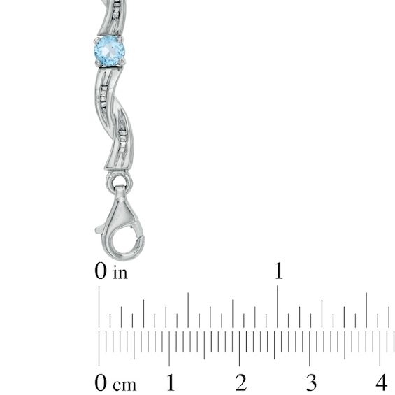 Blue Topaz and 1/20 CT. T.w. Diamond Twist Bracelet in Sterling Silver - 7.25"