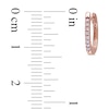 Thumbnail Image 1 of 1/10 CT. T.W. Diamond Huggie Hoop Earrings in 10K Rose Gold