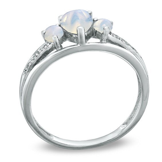 Heart-Shaped Lab-Created Opal and Diamond Accent Three Stone Promise Ring in 10K White Gold Heart-Shaped Lab-Created Opal and Diamond Accent Three Stone Promise Ring in 10K White Gold