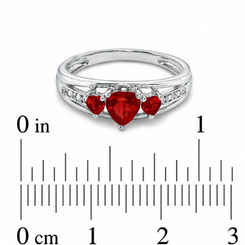 Heart-Shaped Lab-Created Ruby and Diamond Accent Three Stone Promise Ring in 10K White Gold