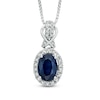 Thumbnail Image 0 of Oval Blue Sapphire and 1/5 CT. T.W. Diamond Pendant in Sterling Silver