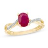 Thumbnail Image 1 of Oval Ruby and Diamond Accent Ring in 10K Gold